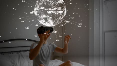 animation of globe with connections over caucasian man wearing vr headset