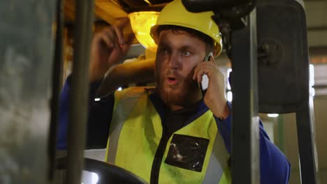 male worker talking on mobile phone 4k