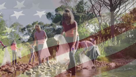 Composite-video-of-american-flag-against-group-of-diverse-volunteers-cleaning-the-forest