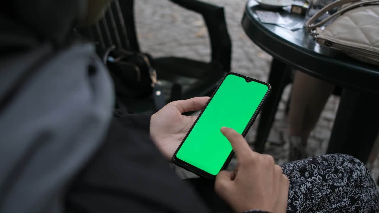 usando la pantalla verde del teléfono