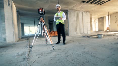 architect working at a construction site, building site