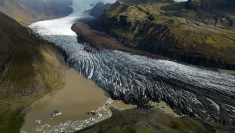 svinafellsjokull glacier, iceland - a scenic view of a glacier - aerial drone shot