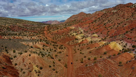 aerial shot of the dusty road of wire pass and the landscape of vermilion cliffs, in northern arizona and southern utah