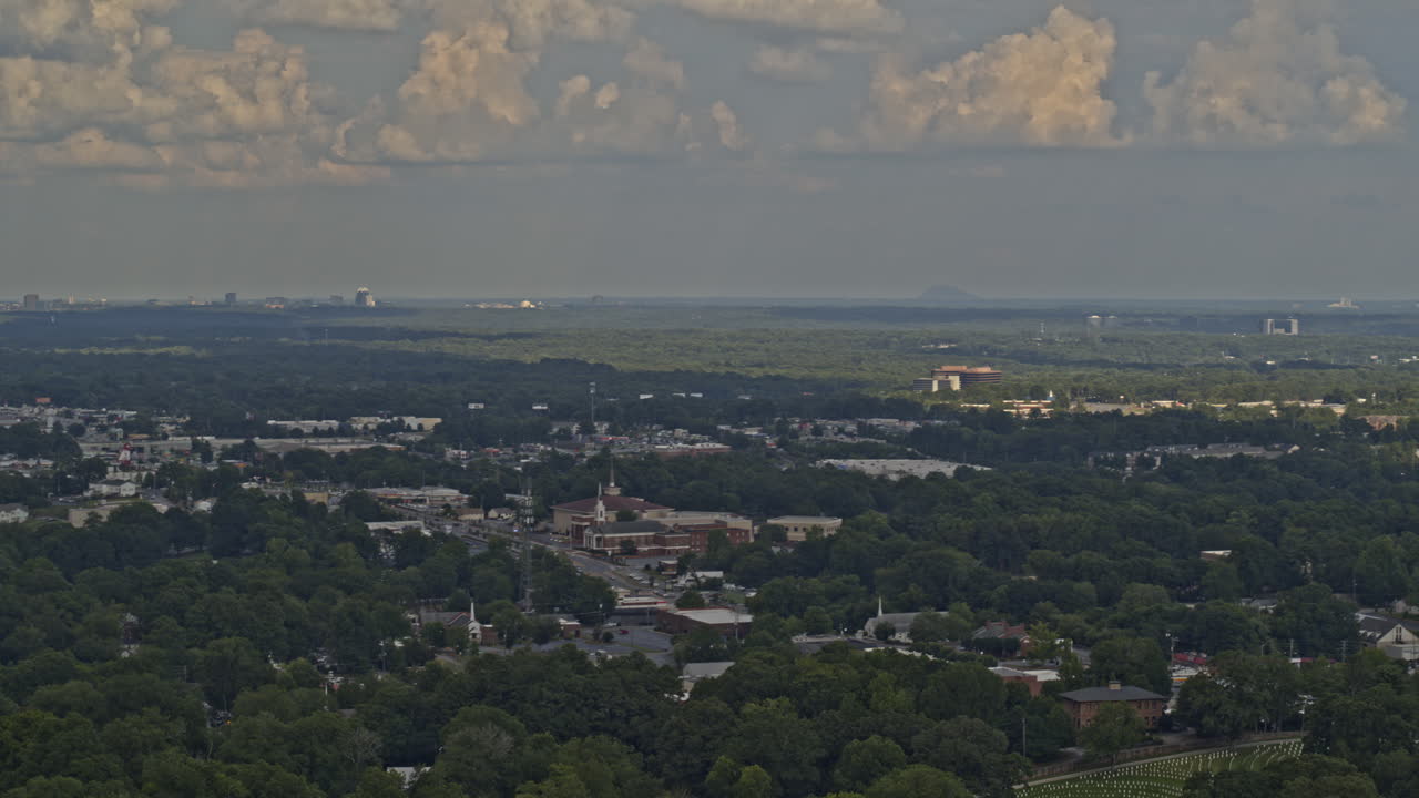 Marietta Georgia Aerial v5 pan right shot of Sandy Springs cityscape and airport during daytime - DJI Inspire 2, X7, 6k - August 2020