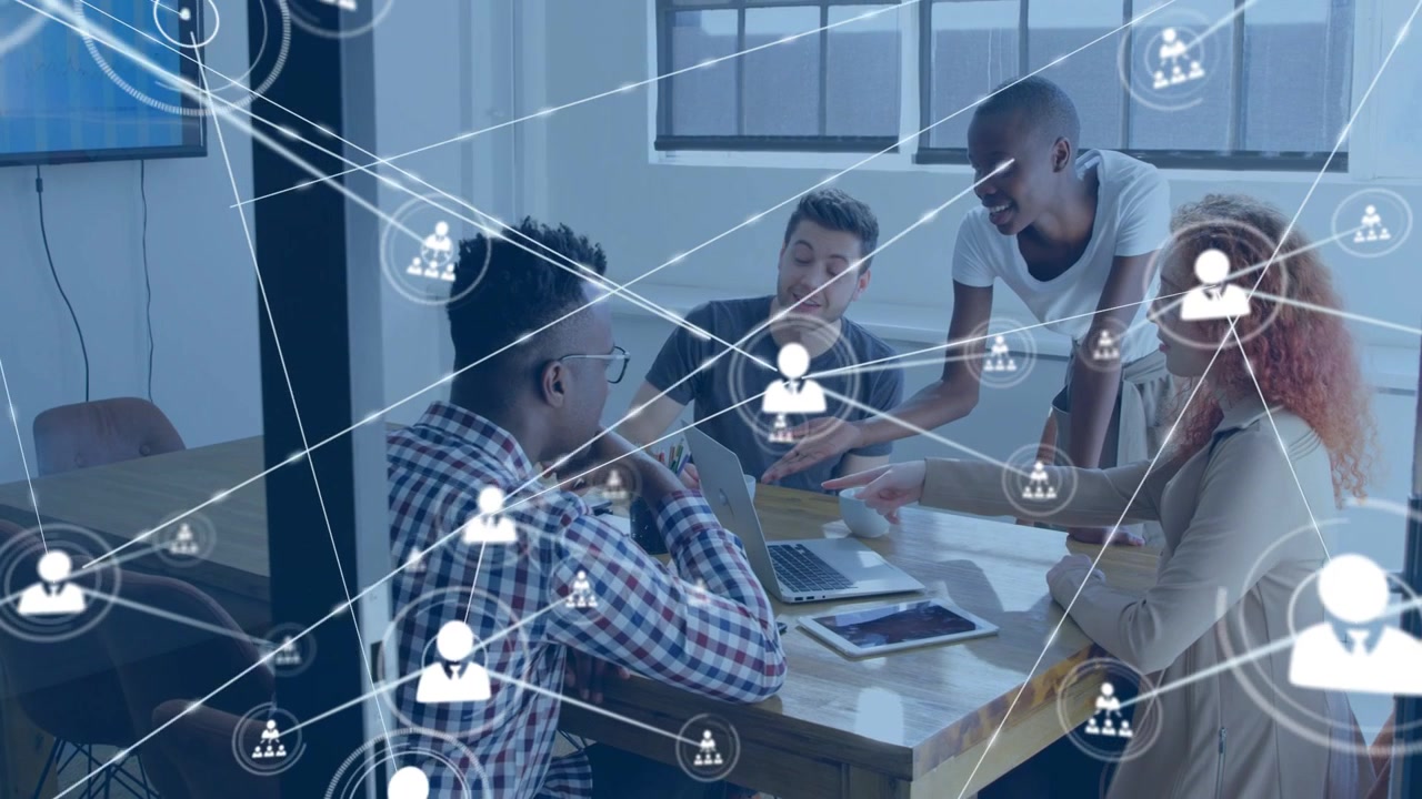Team reviewing documents and pointing in business meeting, network nodes expanding over laptop