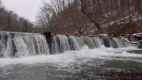 waterfall flowing into the wissahickon creek