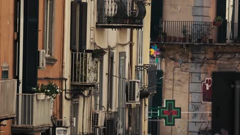 balconied facades on a naples street