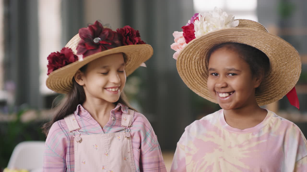 Adorable Children in Straw Hats with Flowers Smiling