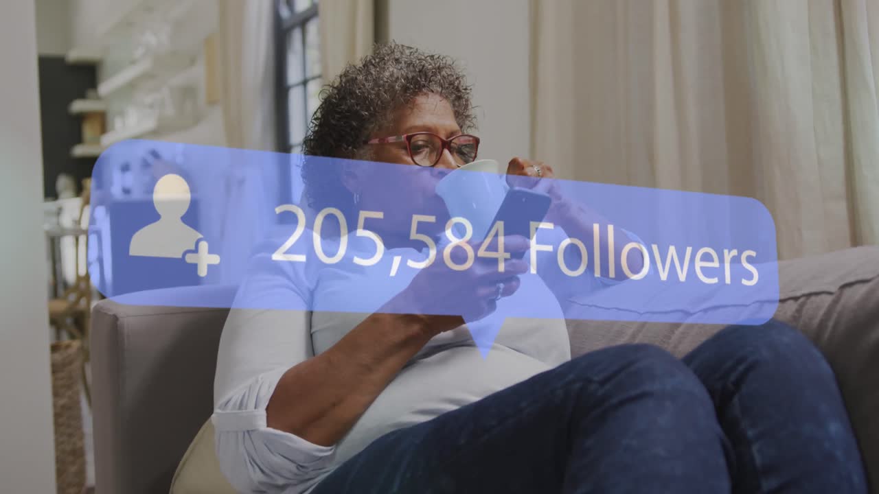 Animation of speech bubble with followers text and numbers over senior woman using smartphone