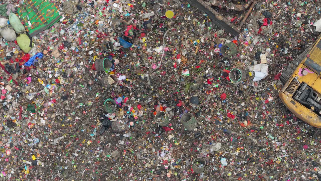 Aerial view of people scavenging in bantar gebang landfill