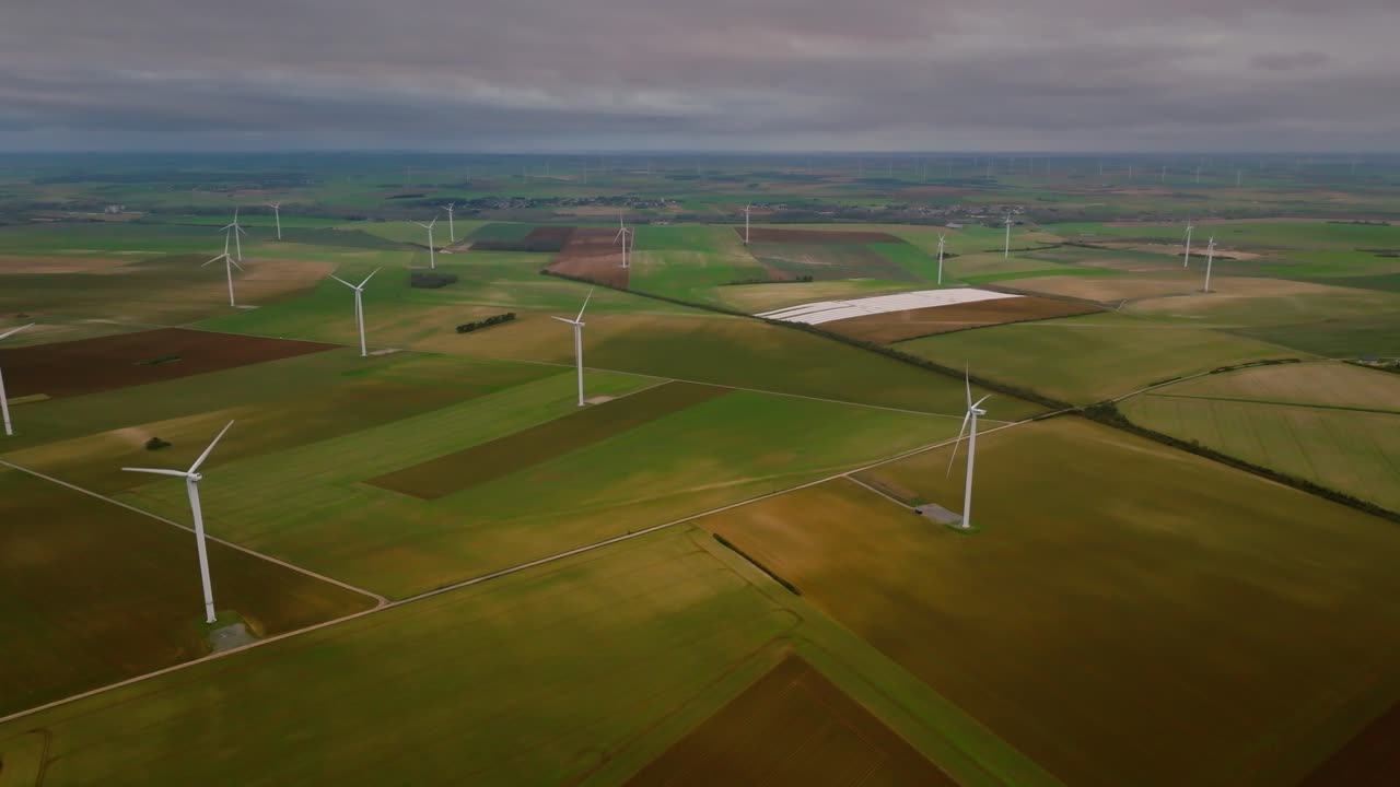 Wind turbine in the middle of a thunderstorm in France, worrying environment