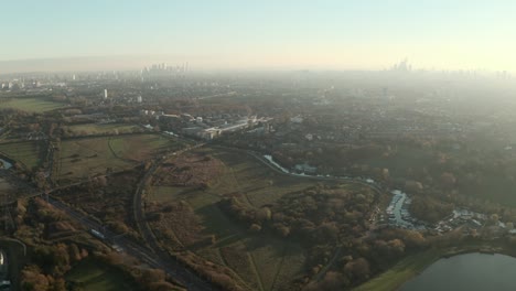 Establishing-drone-shot-of-Lea-valley-Walthamstow-marshes-and-London-skyline