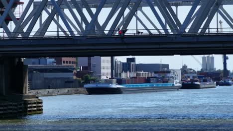 Cargo-Ship-Caronia-Docked-Behind-Dordrecht-Railroad-Bridge-In-Netherlands