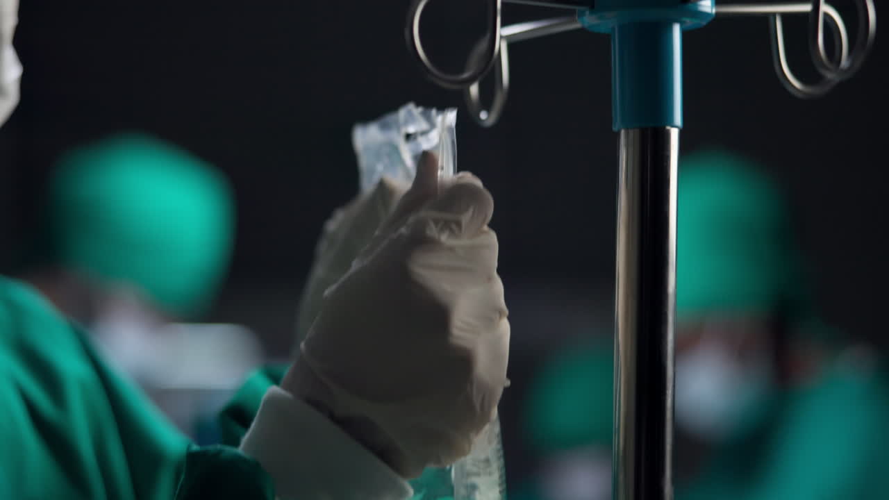 Surgical team preparing for operation in a sterile environment