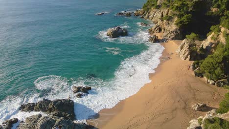 mediterranean beach paradisiaca turquoise blue waters no people aerial view drone spain catalunya costa brava blanes lloret de mar mallorca balearic islands