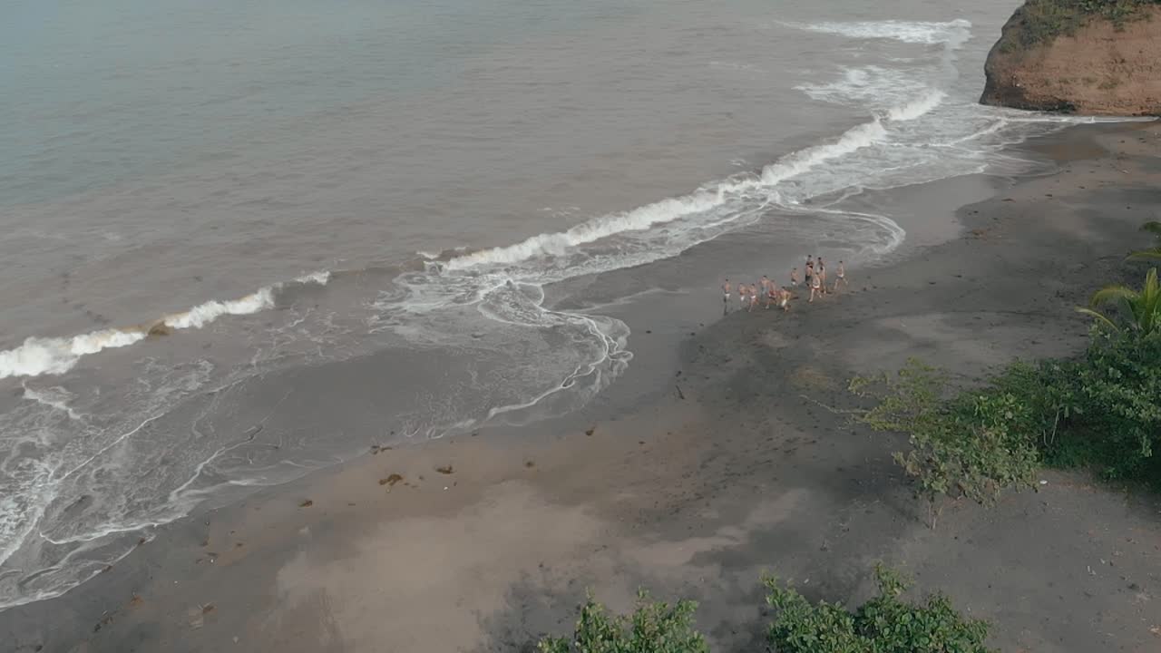 Aerial shot of Bagamanoc beach revealing Buto Ni Kurakog islet, Philippines