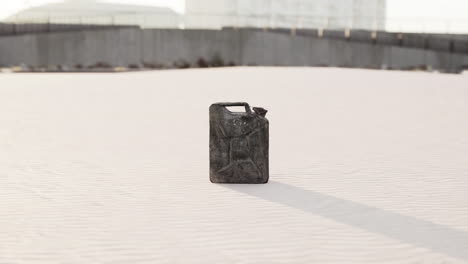 old rusted fuel can on the beach