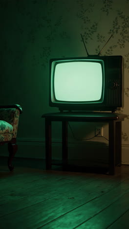 vintage tv in a dimly lit room