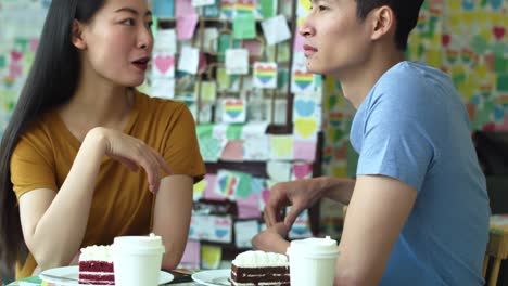 handheld view of happy couple at cafe