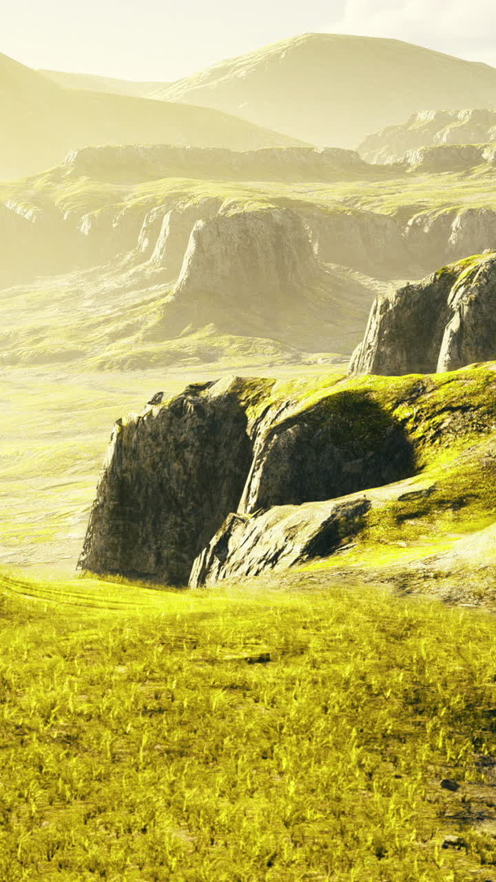 Vast golden landscape under a warm sun showcasing rocky terrain and greenery
