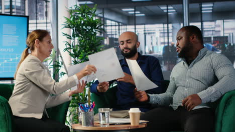 vertical video diverse business professionals using analysis tools to extract insights
