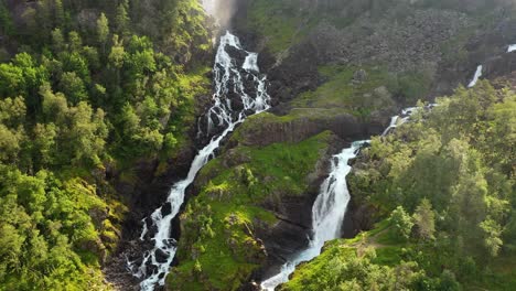 Latefossen-is-one-of-the-most-visited-waterfalls-in-Norway-and-is-located-near-Skare-and-Odda-in-the-region-Hordaland,-Norway.-Consists-of-two-separate-streams-flowing-down-from-the-lake-Lotevatnet.