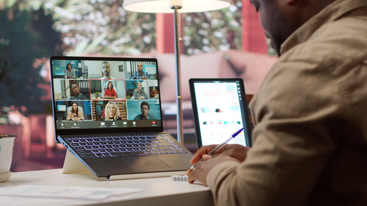 Businessman presents annual sales reports to the shareholders on videocall