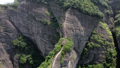 aerial: amazing hike up bajiao shan mountain, chinese mountain steps hike