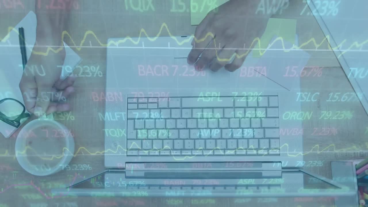 Animation of data processing and stock market over caucasian businessman using laptop
