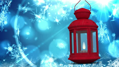 animation of snow falling over christmas lantern