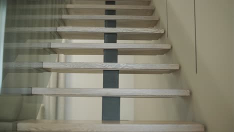 modern minimalist wooden staircase with metal support