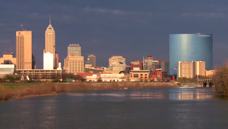 the city of indianapolis at dusk along the white river 3