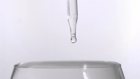 drop falling from pipette in super slow motion