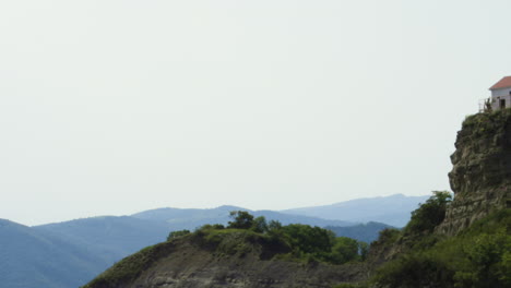 panorama of mountain range around orthodox church of st