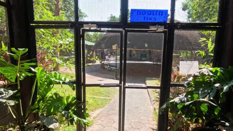 visitor enters zoo through gate in thailand