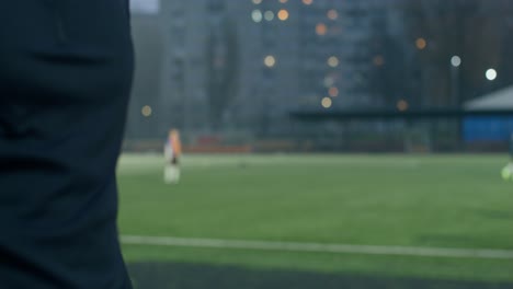 athlete warming up on a soccer field