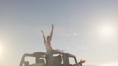 animation of light spots over caucasian woman with arms outstretched