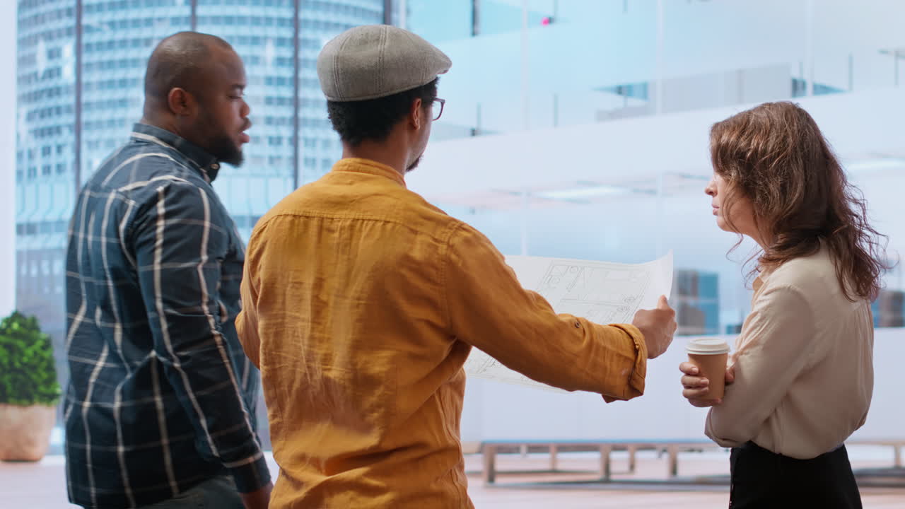 Professional team touring an office space with real estate agent