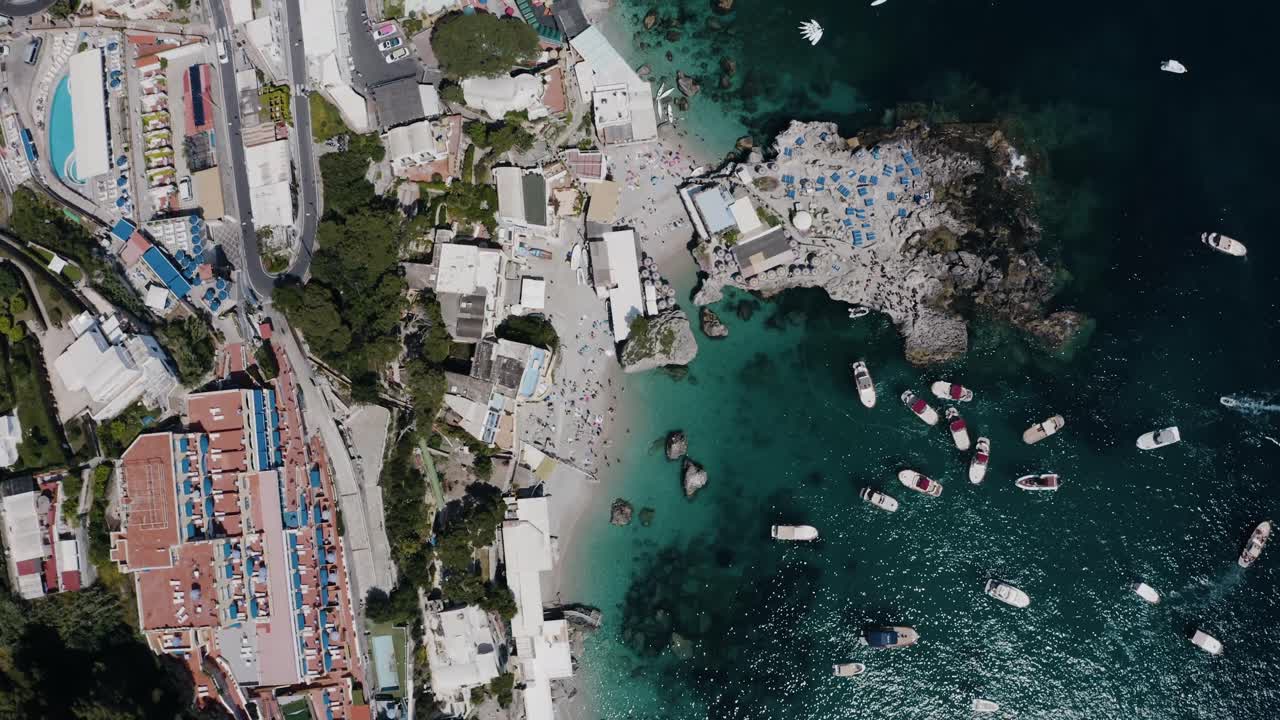 Top down drone shot of Capri, Italy's unique coast line