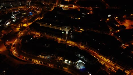 amazing night time drone shot of city in spain tenerife los gigantes on top of mountain drone shot in 4k south island