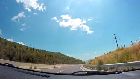 timelapse footage from car dashboard at moreas highway located at peloponnese, greece