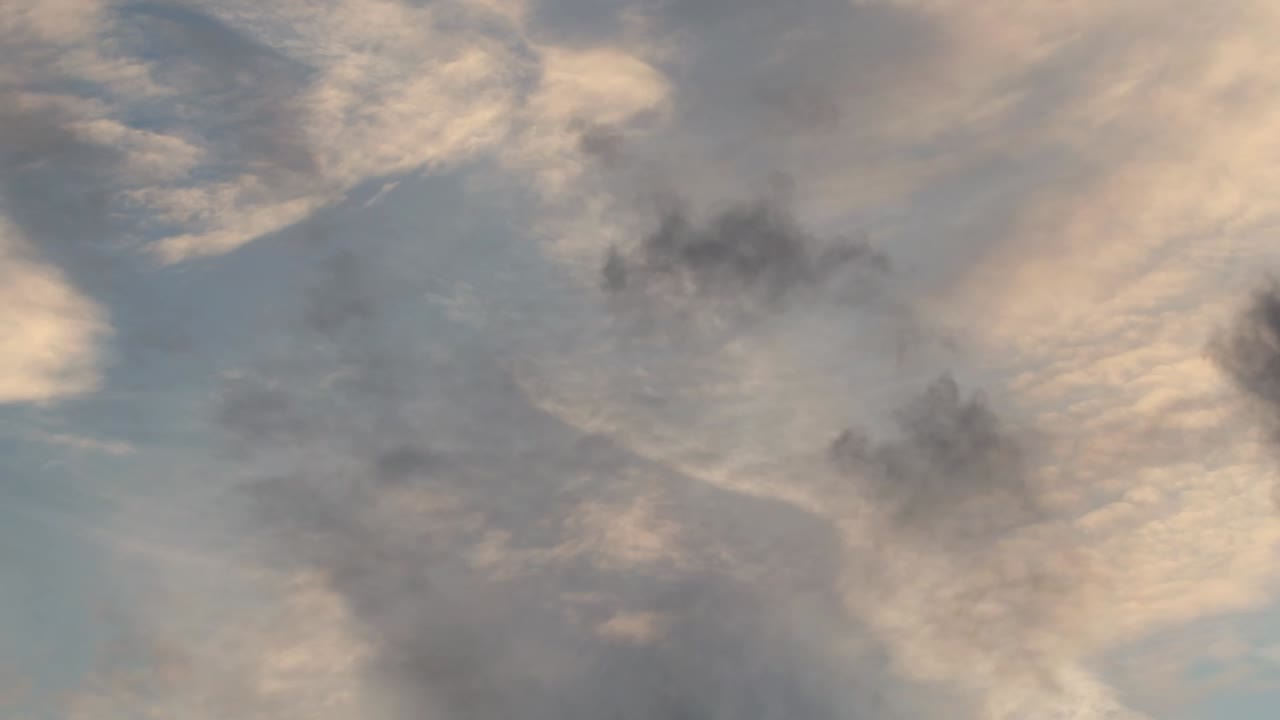 Slowly moving clouds in an autumn day