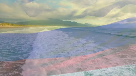 Animation-Der-Flagge-Kolumbiens,-Die-über-Einem-Sonnigen-Strand-Weht-Und-Wellen-Im-Meer-Brechen