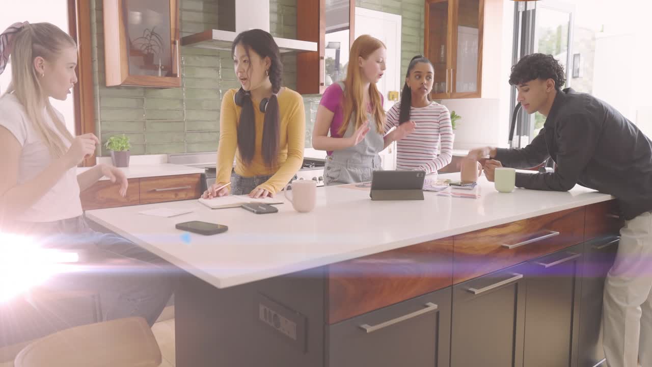 Man entering from right, five adults leaning over island, animated charts rising for business plan