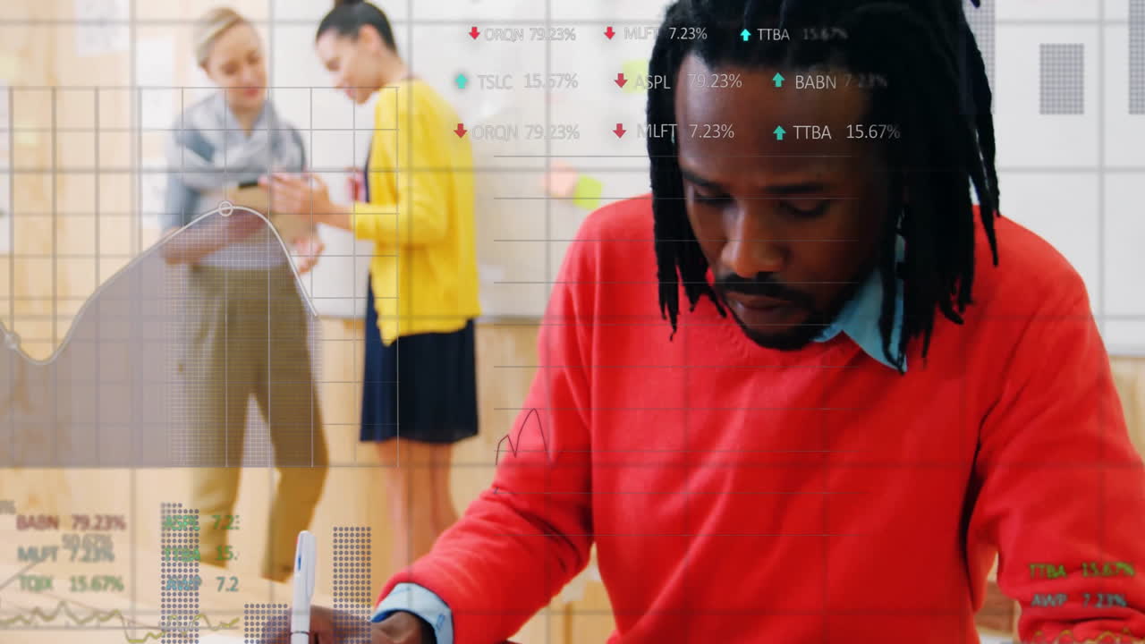 Animation of diagrams and stock market over diverse colleagues discussing work and writing in office