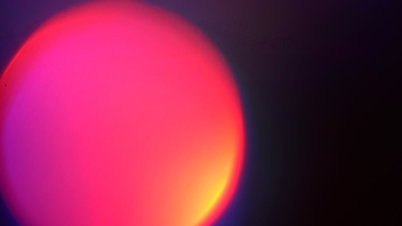 abstracto 4k lente de resplandor video en color