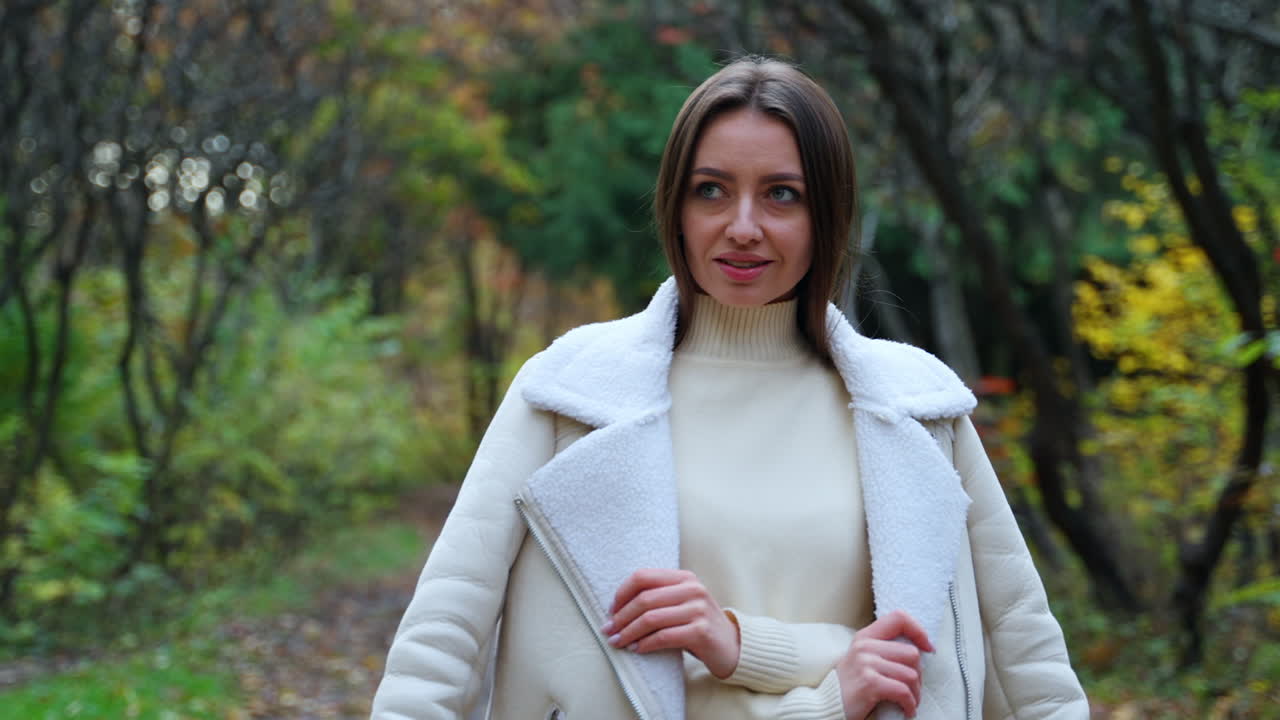 Woman in a Fall Park