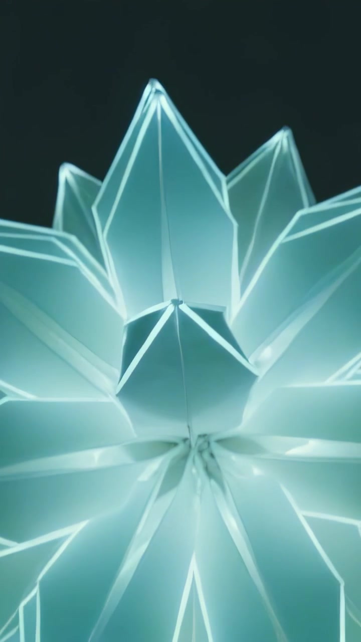 Vertical video: Flashing LED in faceted ornament, shifting colors over dark set, highlighting hub