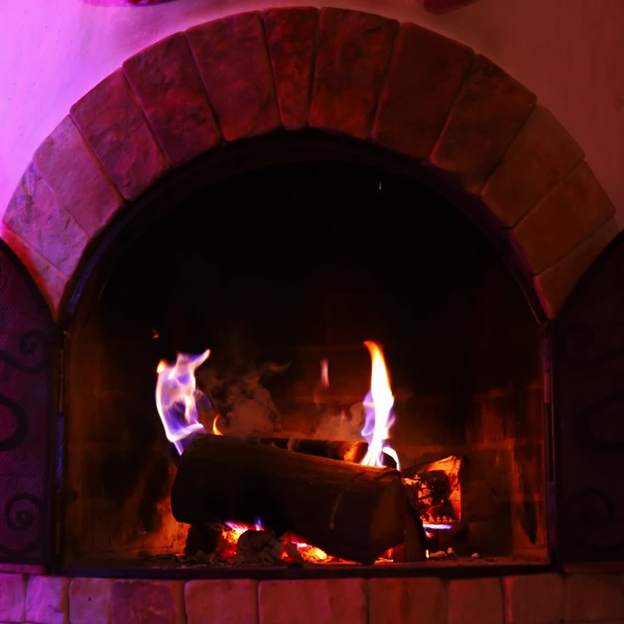 Fireplace With Roaring Flames