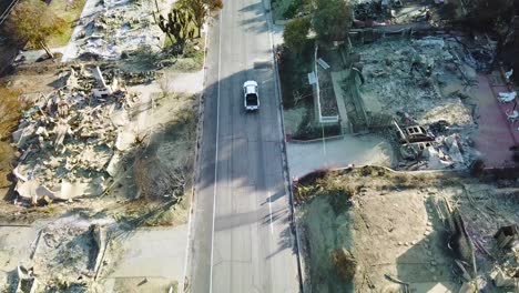 Aerial-over-entire-street-of-hillside-homes-destroyed-by-fire-in-Ventura-California-following-the-Thomas-wildfire-in-2017-3